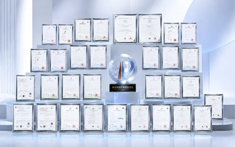 Framed certificates and the National Intellectual Property Advantage Enterprise award on display at the Petaful factory.