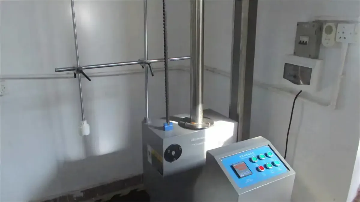 Lab impact tester for packaging durability, one of the checks behind cartons that survive the export trip.