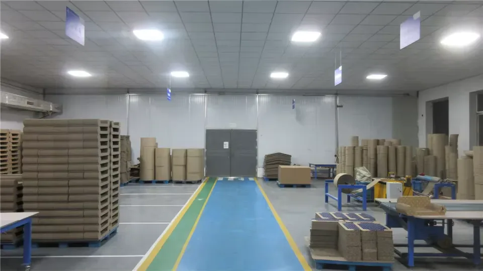 Finished goods in a clear dispatch warehouse, pallets aligned for export pickup.